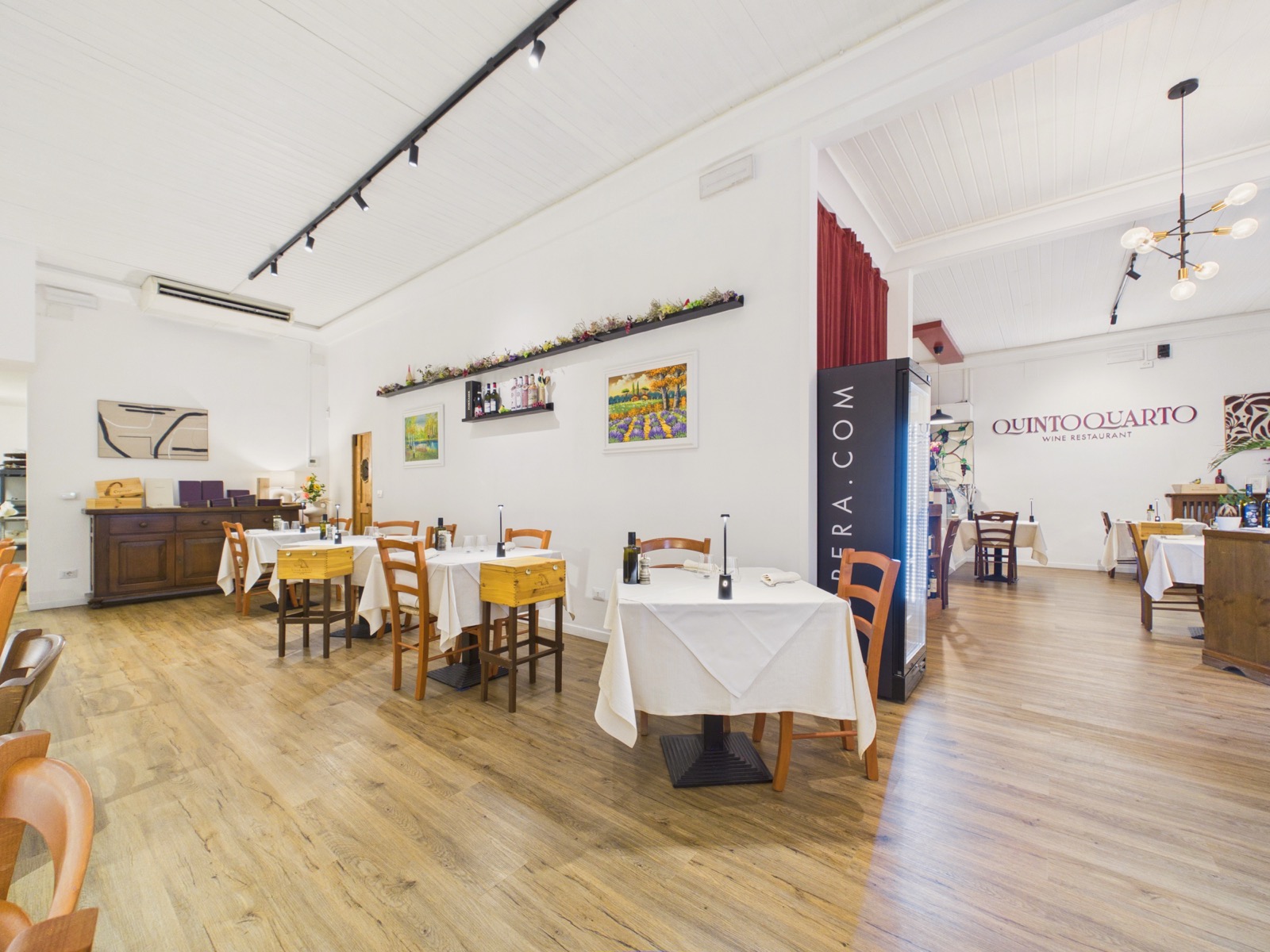 Quinto Quarto Wine Restaurant — angolo bar e cantina